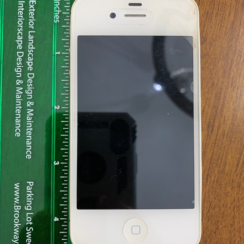 Used iPhone 4, excellent condition, includes accessories